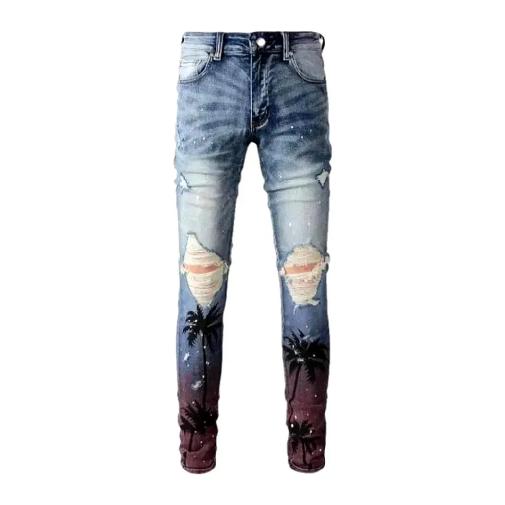 Distressed men's palms-print jeans