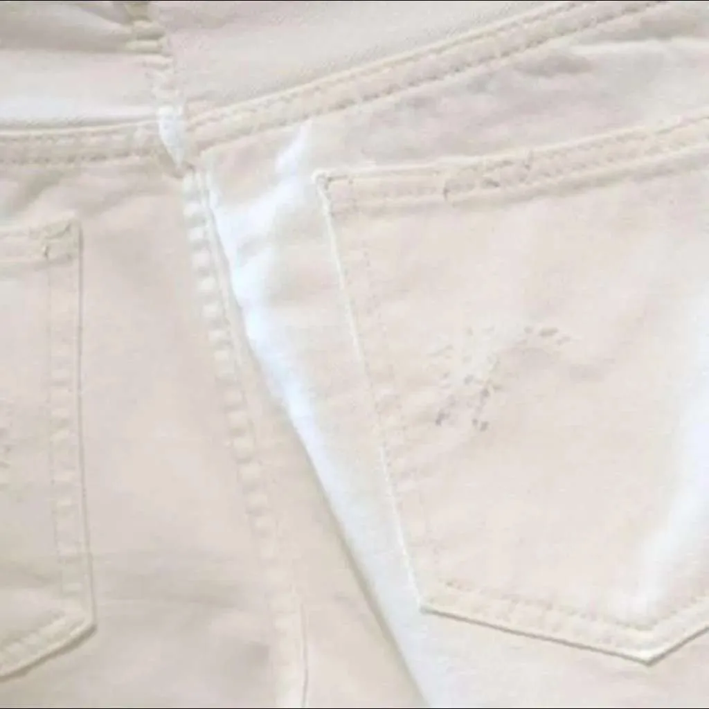 White men's distressed denim shorts